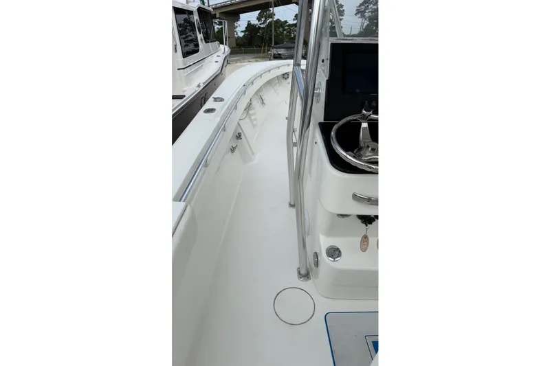 Slide: The Image of 2007 SeaCraft SC 32 Master Angler boat deck with steering wheel and railing. - 39