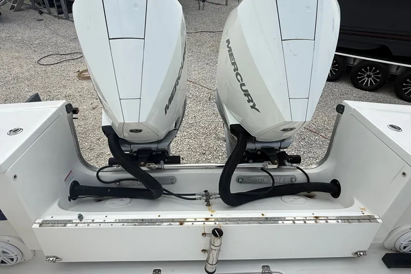 Slide: The Image of Twin Mercury outboard engines on a 2007 SeaCraft SC 32 Master Angler boat. - 31