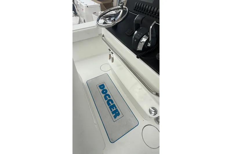 Slide: The Image of 2007 SeaCraft SC 32 Master Angler boat console with steering wheel and controls. - 29