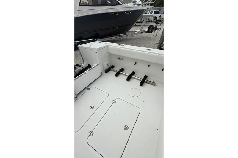 Slide: The Image of 2007 SeaCraft SC 32 Master Angler boat interior, featuring spacious deck and storage compartments. - 30