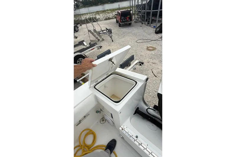 Slide: The Image of Open storage compartment on 2007 SeaCraft SC 32 Master Angler boat deck. - 33