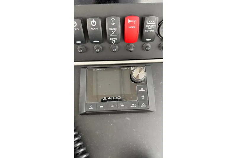 Slide: The Image of Control panel of a 2007 SeaCraft SC 32 Master Angler with JL Audio system. - 18