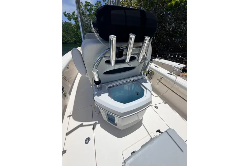 Slide: The Image of 2023 Pathfinder 2400 Open boat interior with rod holders and seating. - 11