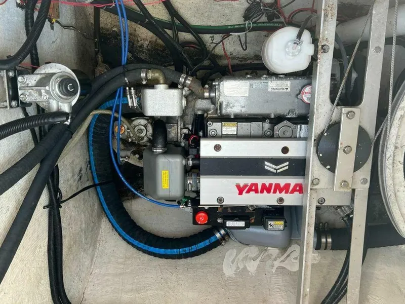 Slide: The Image of Engine compartment of a 1995 Voyage Yachts Mayotte with a Yanmar engine. - 12