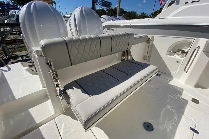 Slide: The Image of 2026 Pursuit S 288 Sport boat with luxurious seating and dual engines. - 5