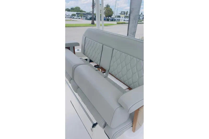 Slide: The Image of Luxurious seating on 2026 Pursuit S 288 Sport boat with quilted upholstery. - 11