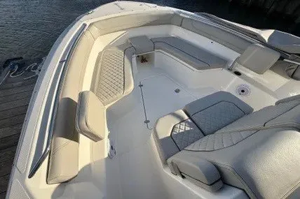 Slide: The Image of 2026 Pursuit S 288 Sport boat interior with cushioned seating and sleek design. - 6