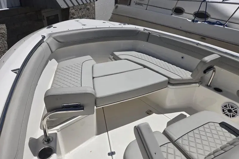 Slide: The Image of 2026 Pursuit S 288 Sport boat interior with luxurious seating and modern design. - 7