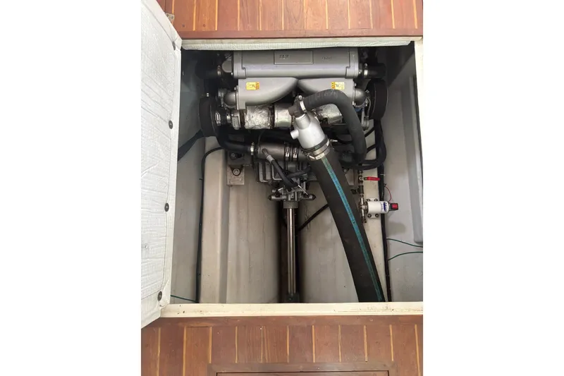 Slide: The Image of Engine compartment of a 2018 Eastern 35 Casco Bay boat, showcasing mechanical components. - 27