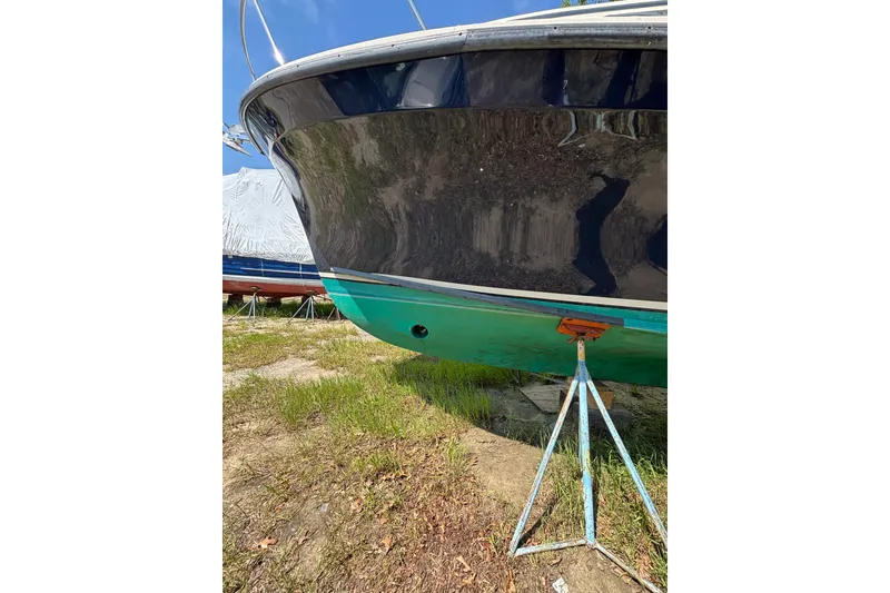 Slide: The Image of 2018 Eastern 35 Casco Bay boat on stands, hull view, outdoors. - 37