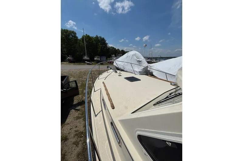 Slide: The Image of 2018 Eastern 35 Casco Bay boat docked under clear blue sky. - 32
