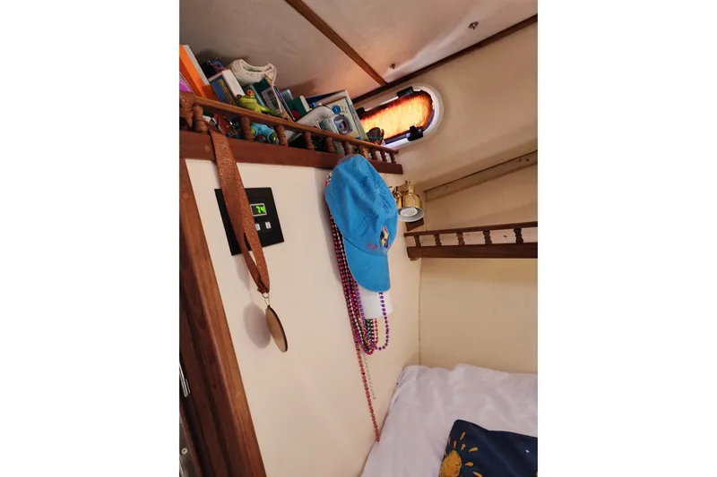 Slide: The Image of Cozy cabin interior of 2018 Eastern 35 Casco Bay boat with decor and accessories. - 26