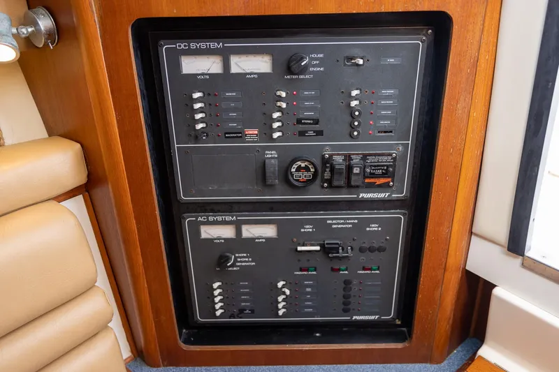 Slide: The Image of Electrical control panel on a 1997 Tiara Yachts 3500 Express boat. - 51