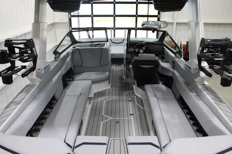 Slide: The Image of 2026 Nautique Super Air Nautique G25 interior with sleek seating and modern design. - 9