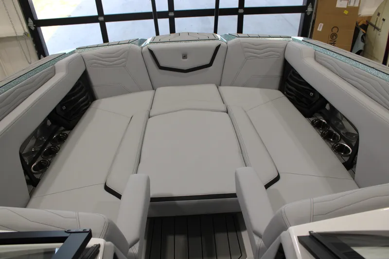 Slide: The Image of Interior seating of 2026 Nautique Super Air Nautique G25 boat, featuring luxurious upholstery. - 17