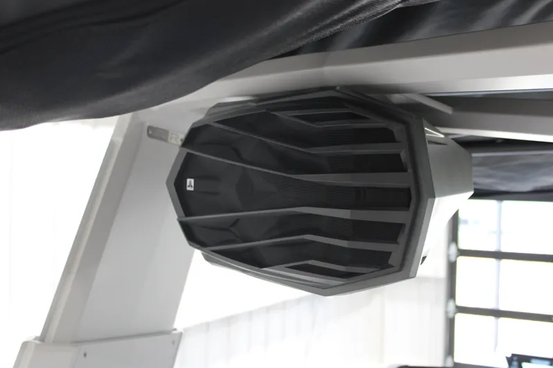 Slide: The Image of 2026 Nautique Super Air Nautique G25 boat speaker, sleek design, mounted under a canopy. - 10