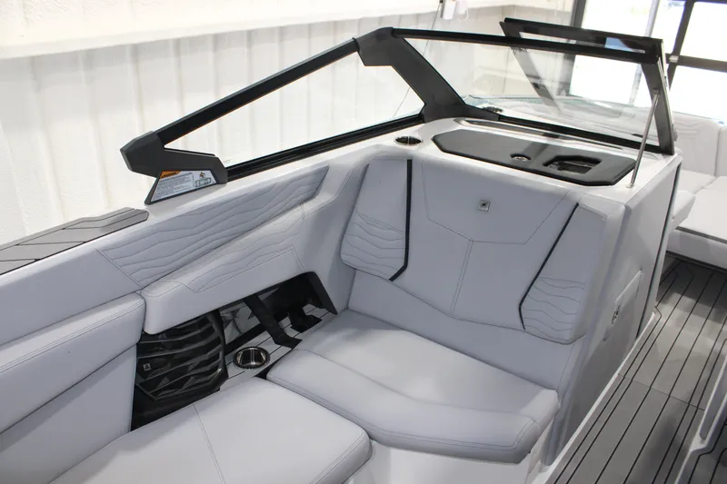 Slide: The Image of 2026 Nautique Super Air Nautique G25 interior with sleek seating and modern design. - 12