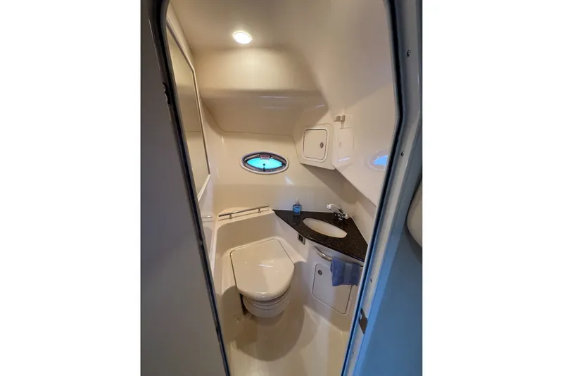 Slide: The Image of Luxurious bathroom in 2006 Sea Ray 44 Sundancer yacht with modern amenities. - 18