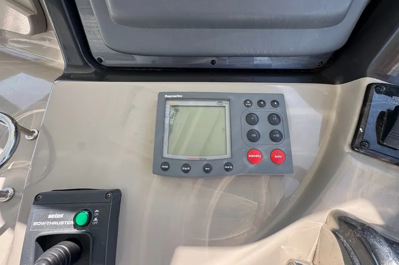 Slide: The Image of Control panel of a 2006 Sea Ray 44 Sundancer boat with Raymarine display. - 13