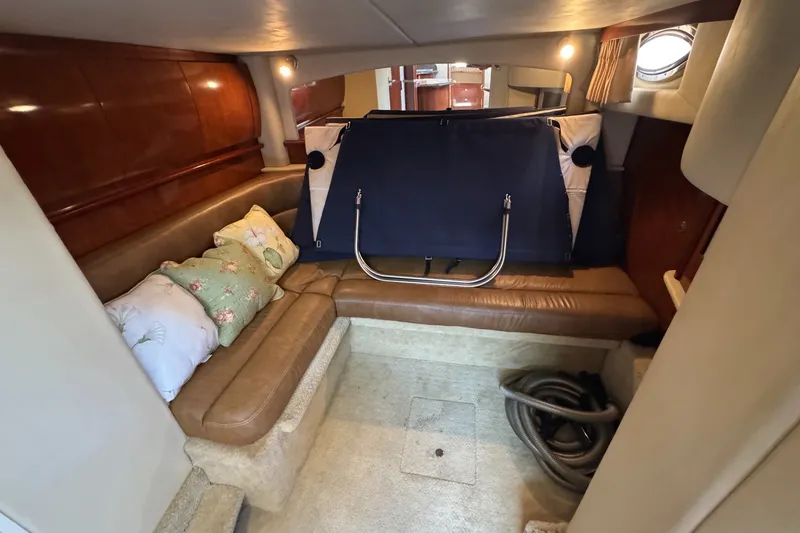 Slide: The Image of Interior cabin of 2006 Sea Ray 44 Sundancer with leather seating and decorative pillows. - 19