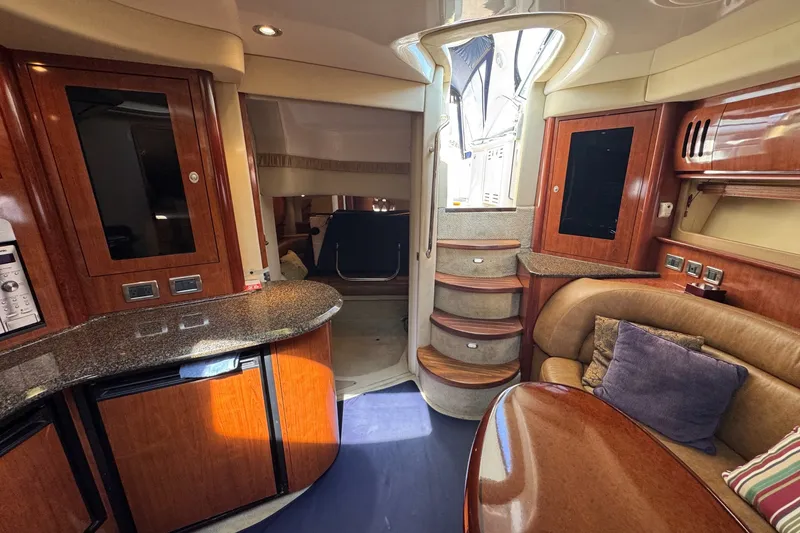 Slide: The Image of Luxurious interior of 2006 Sea Ray 44 Sundancer yacht with elegant wood finishes. - 20