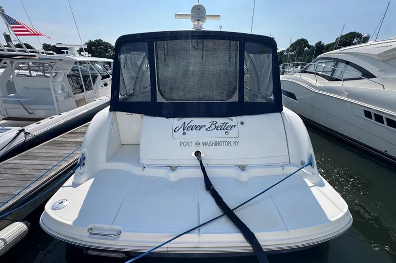 Slide: The Image of 2006 Sea Ray 44 Sundancer docked, rear view with "Never Better" name, Port Washington, NY. - 6