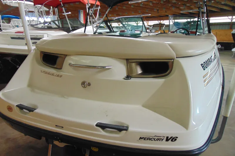 Slide: The Image of 2001 Sea-Doo Utopia 185 boat with Mercury V6 engine in storage. - 4