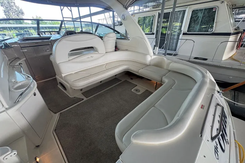 Slide: The Image of Luxurious interior of a 2003 Sea Ray 410 Sundancer yacht with plush seating. - 18
