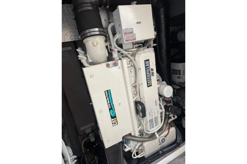 Slide: The Image of Caterpillar engine in 2003 Sea Ray 410 Sundancer boat, showcasing 380 HP power. - 57