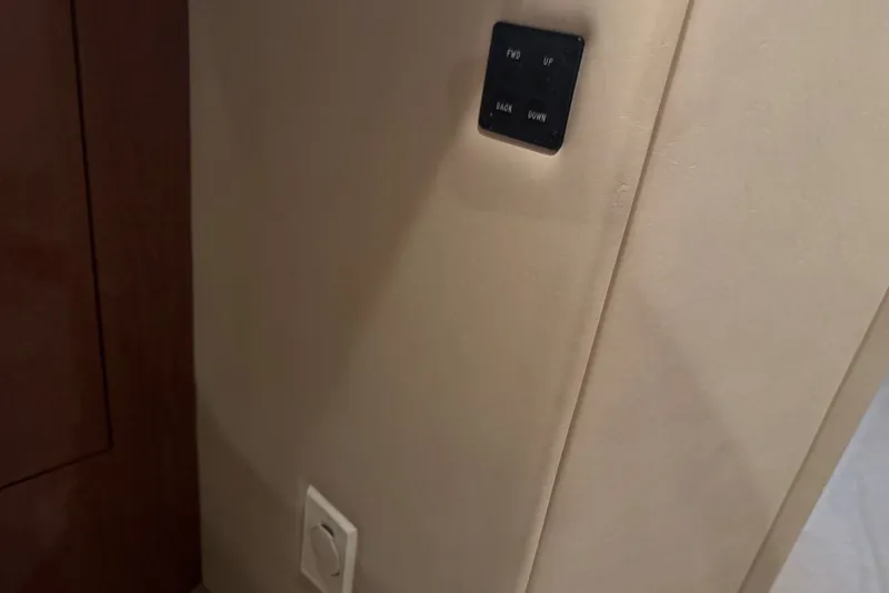 Slide: The Image of Interior control panel on 2003 Sea Ray 410 Sundancer yacht. - 51