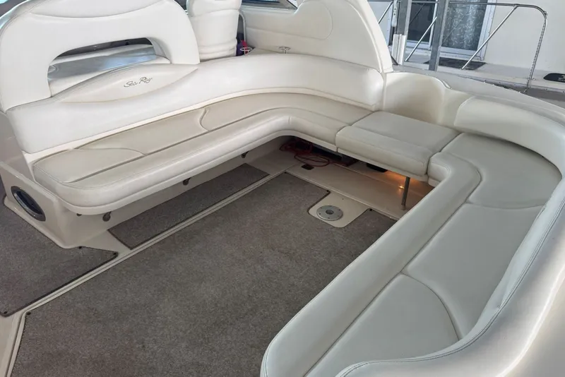 Slide: The Image of Luxurious seating area on a 2003 Sea Ray 410 Sundancer yacht. - 19