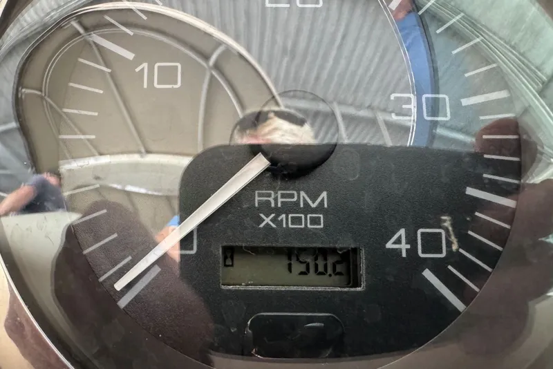 Slide: The Image of Close-up of a 2003 Sea Ray 410 Sundancer tachometer showing 750.2 RPM. - 32
