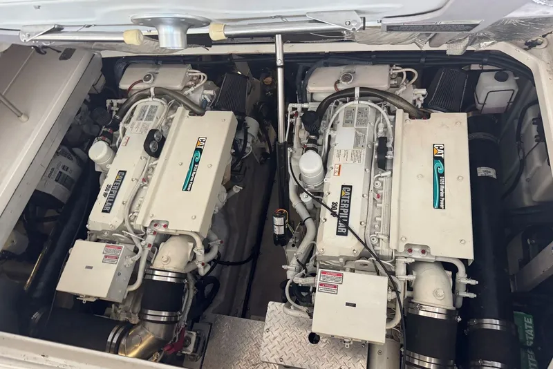 Slide: The Image of Engine room of a 2003 Sea Ray 410 Sundancer with twin Caterpillar engines. - 56