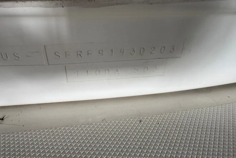 Slide: The Image of Hull identification number on 2003 Sea Ray 410 Sundancer boat. - 66