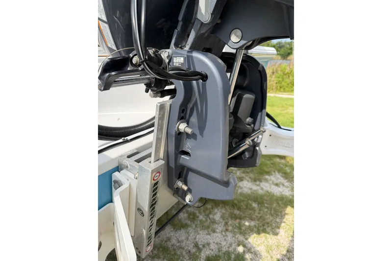 Slide: The Image of 2019 Sportsman Masters 227 Bay Boat engine mount detail, showcasing mechanical components. - 15