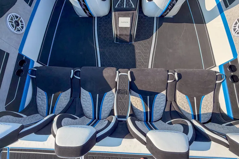 Slide: The Image of Interior of a 2026 Doug Wright 36 boat featuring stylish seating and modern design elements. - 8