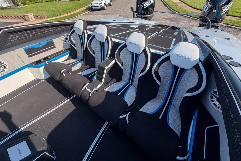 Slide: The Image of Interior of a 2026 Doug Wright 36 boat with stylish seating and modern design. - 9