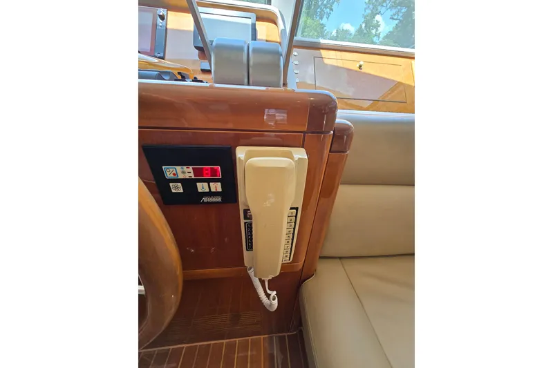 Slide: The Image of Control panel and phone on 2004 Grand Harbour 58 yacht interior. - 31