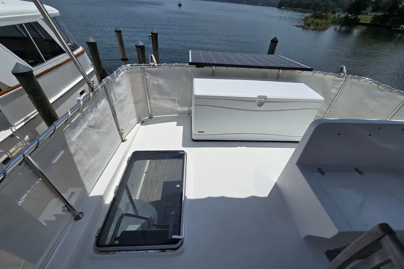 Slide: The Image of Deck of 2004 Grand Harbour 58 yacht with storage box and solar panel. - 85