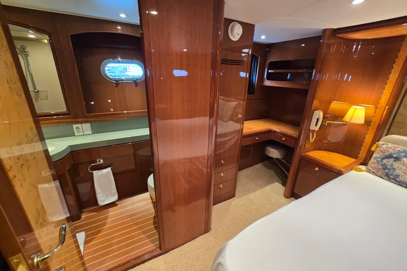 Slide: The Image of Luxurious 2004 Grand Harbour 58 yacht interior with wood finish and elegant furnishings. - 43