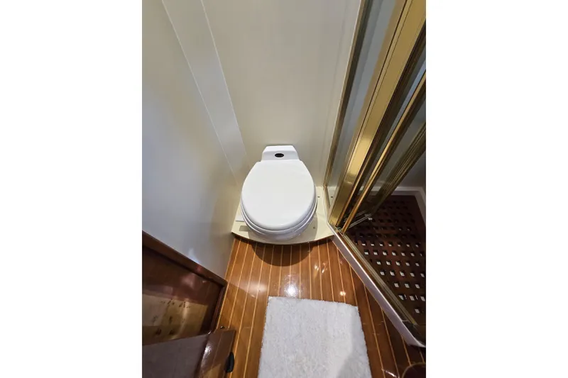 Slide: The Image of Luxury yacht bathroom with toilet and shower, Grand Harbour 58, 2004 model. - 73