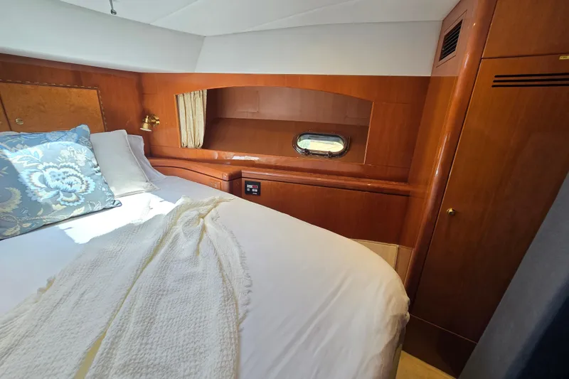 Slide: The Image of Luxurious cabin interior of 2004 Grand Harbour 58 yacht with elegant wood finish. - 69