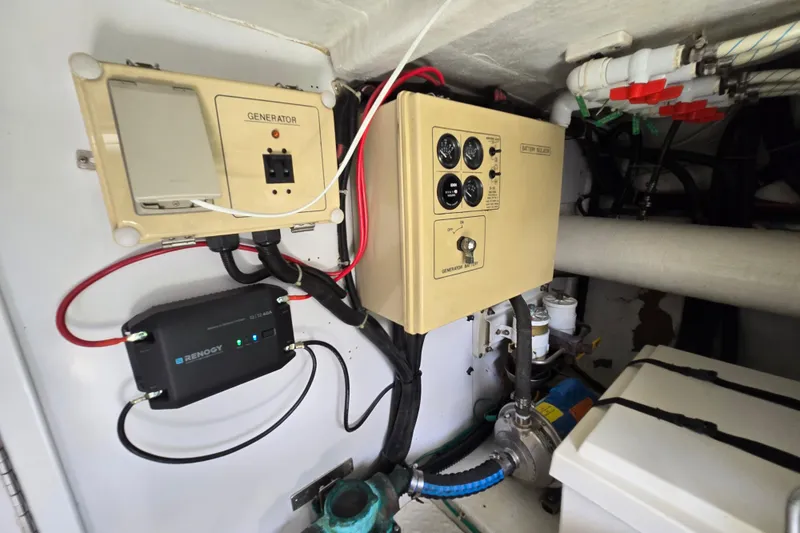 Slide: The Image of Electrical control panel in a 2004 Grand Harbour 58 yacht engine room. - 127