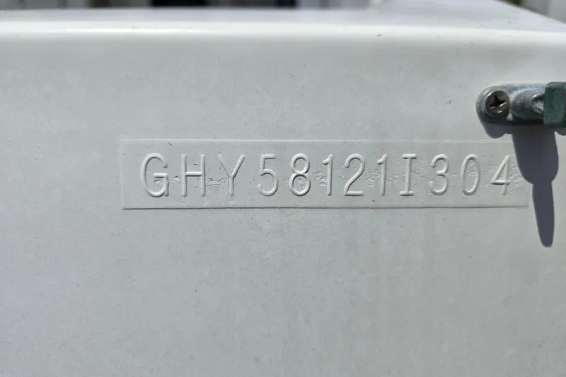 Slide: The Image of Hull identification number on a 2004 Grand Harbour 58 boat. - 6