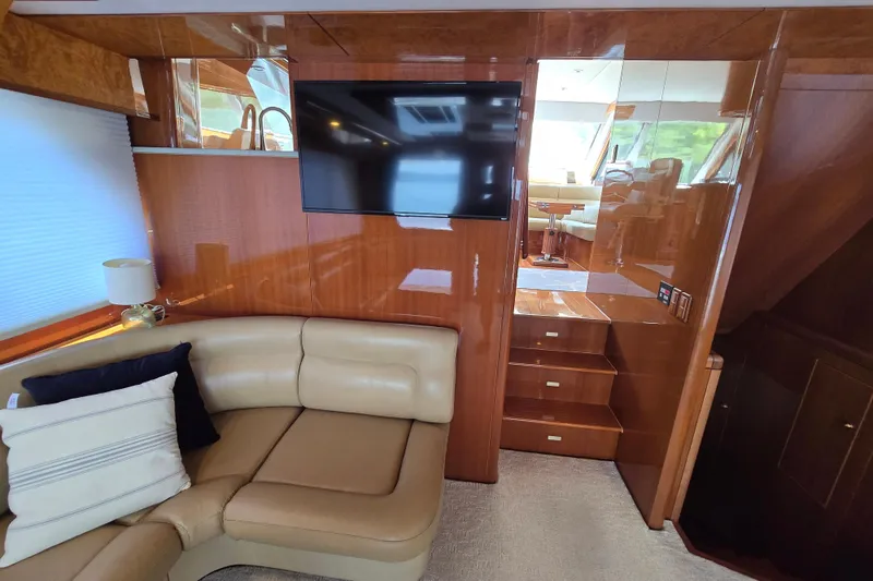 Slide: The Image of Luxurious interior of 2004 Grand Harbour 58 yacht with leather seating and mounted TV. - 11