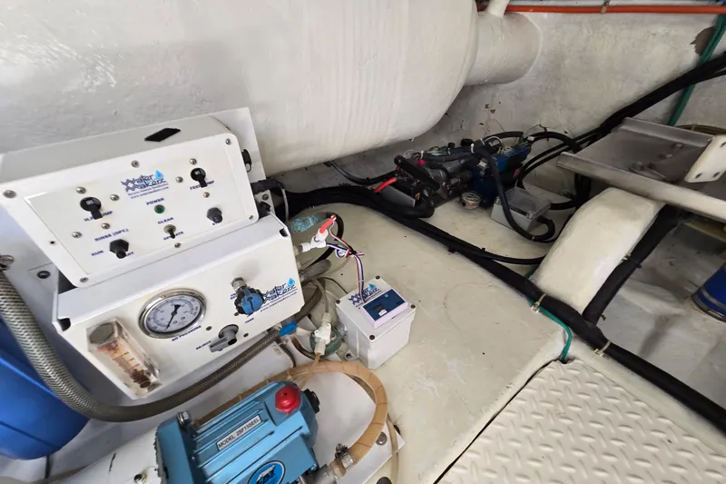 Slide: The Image of Engine room of 2004 Grand Harbour 58 yacht with watermaker system and control panel. - 108
