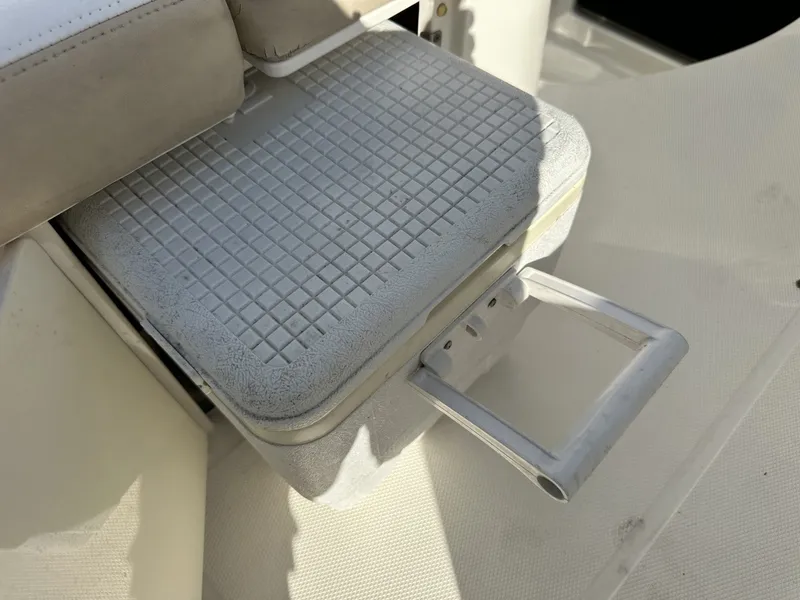 Slide: The Image of A retractable cup holder on a boat seat. - 34