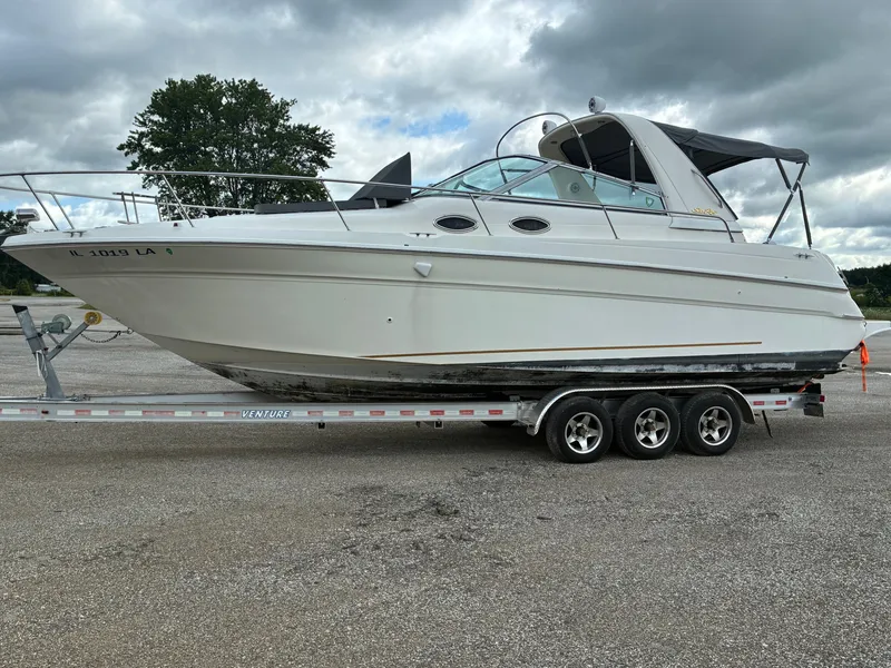 Slide: The Image of A 1998 Sea Ray 290 Sundancer on a trailer, ready for the water. - 5