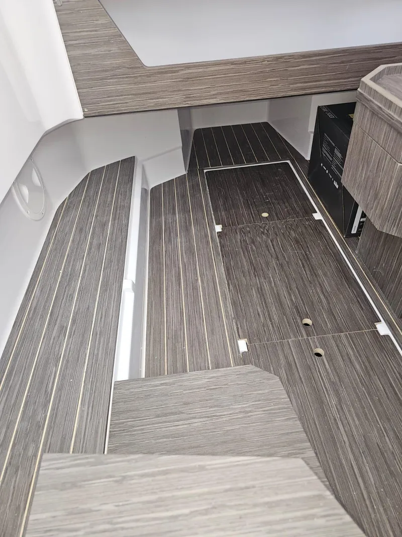 Slide: The Image of Interior flooring of 2025 Ranieri CAYMAN 27.0 SPORT TOURING boat. - 17