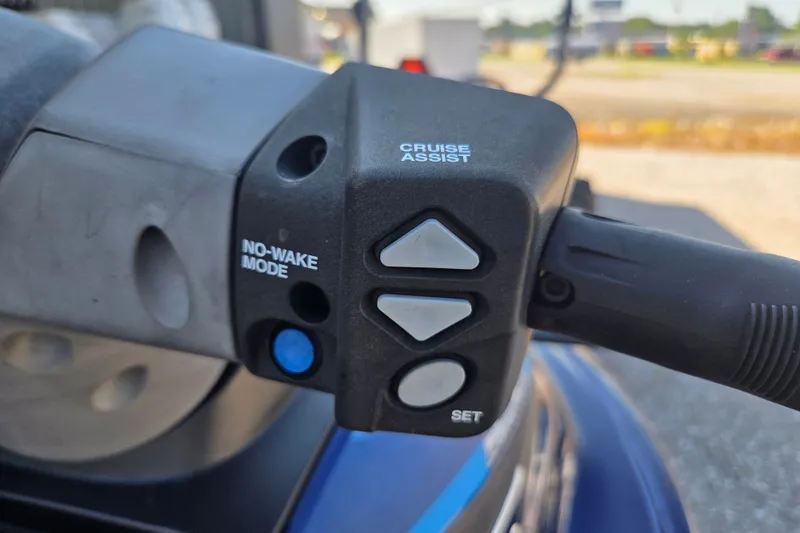Slide: The Image of Close-up of 2015 Yamaha WaveRunner VX Cruiser handle controls with cruise assist and no-wake mode. - 5